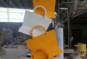現(xiàn)代手提包雕塑廠家 大型別墅區(qū)擺件 烤漆手提包雕塑生產(chǎn)